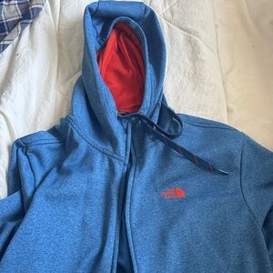 The North Face Blue Jacket with orange Interior
